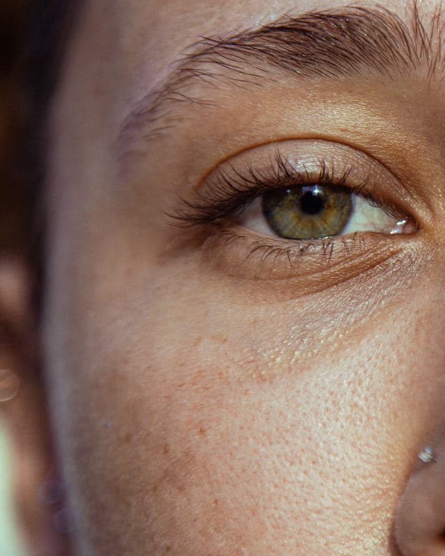 Close-up of an eye with shadows underneath